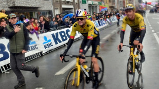 Laporte sweeps to victory in wet and wild Ghent-Wevelgem