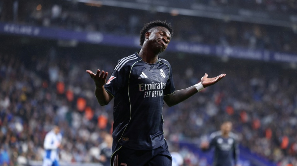 Vinicius double delays Barca title as Real Madrid down Espanyol