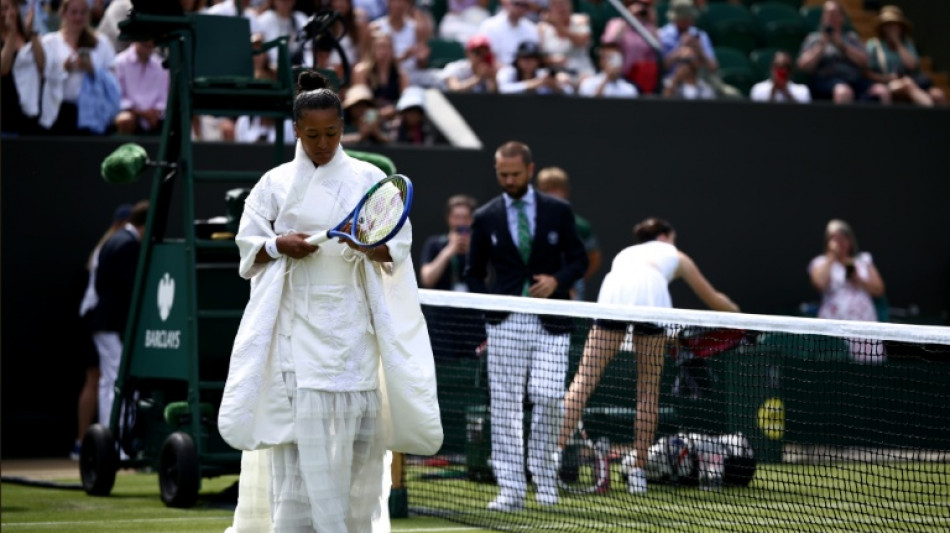 Queueing, strawberries and all white: it must be Wimbledon