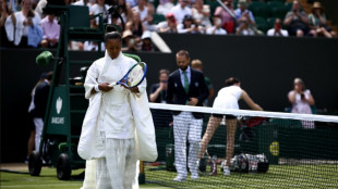 Queueing, strawberries and all white: it must be Wimbledon