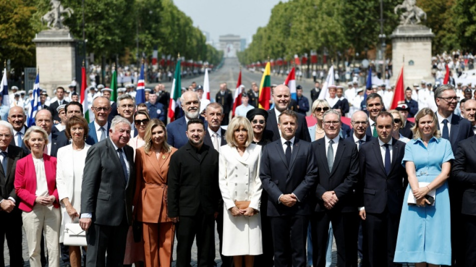 France flaunts firepower, unity with allies in huge parade