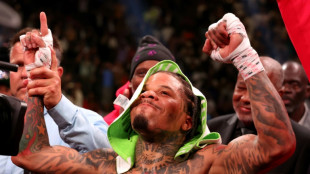 Davis stops Garcia to remain unbeaten in marquee bout