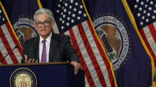 US Fed pauses rate hikes but expects another rise this year