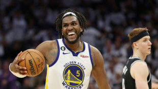 Looney's rebounding sparks Warriors into NBA second round