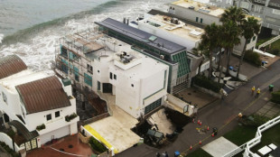 Evacuations in Malibu after waves open sinkhole at Nicolas Cage's house