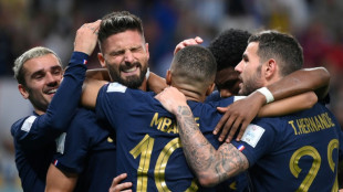 Giroud equals Henry mark as World Cup holders France sink Australia 