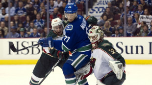 Canucks hire Malhotra as coach after NHL-worst season 