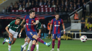 Lewandowski double rescues Barca against Alaves, Sevilla hold Betis