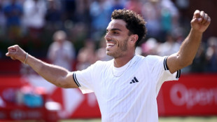 Cerundolo outlasts Paul to win marathon Queen's Club final