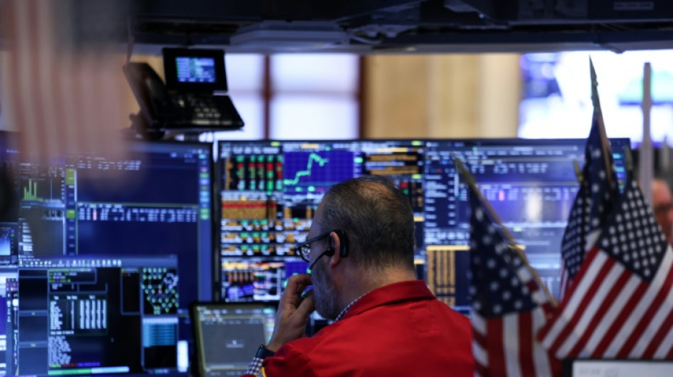 Wall Street termine sans direction claire, fait une pause avant la Fed