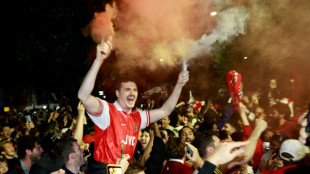 Arsenal players in dawn celebrations after winning Premier League