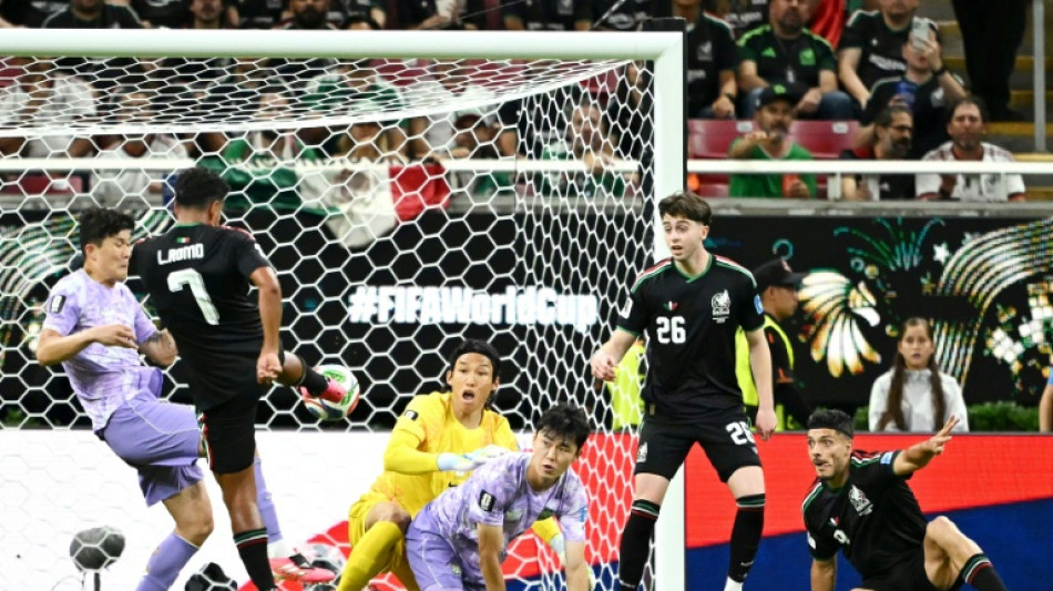 Co-hosts Mexico first team into World Cup knockout rounds