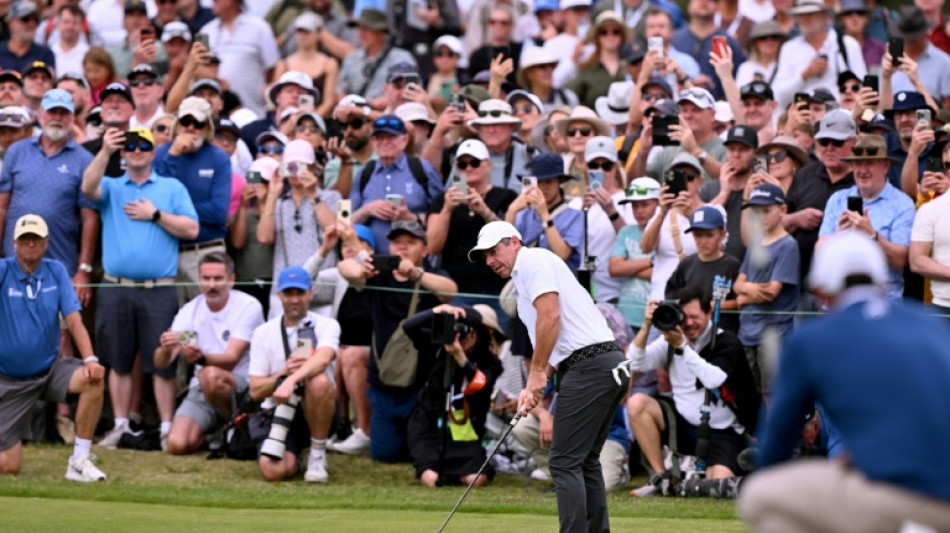 Struggling McIlroy pulls in crowds as three share Australian Open lead  