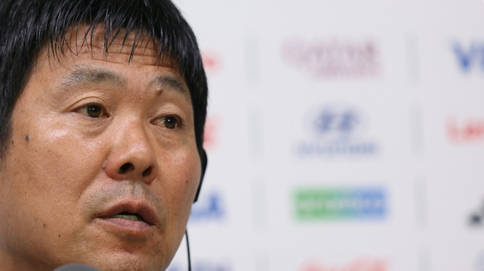 Japan wary of fired up and wounded Tunisia for World Cup landmark game