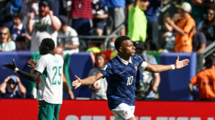 Mbappe double fires France to opening win over Senegal