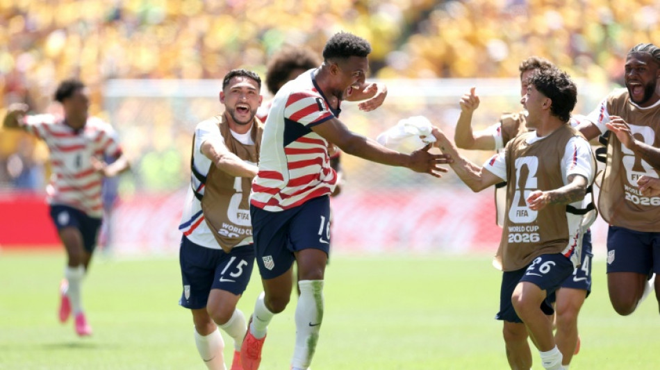 USA down Australia to reach World Cup knockout rounds, Brazil swat Haiti