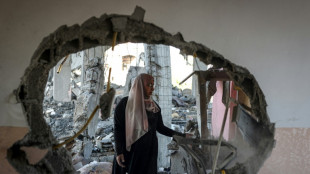 Decenas de cuerpos exhumados en un hospital de Gaza, donde Israel promete aumentar su presi&oacute;n