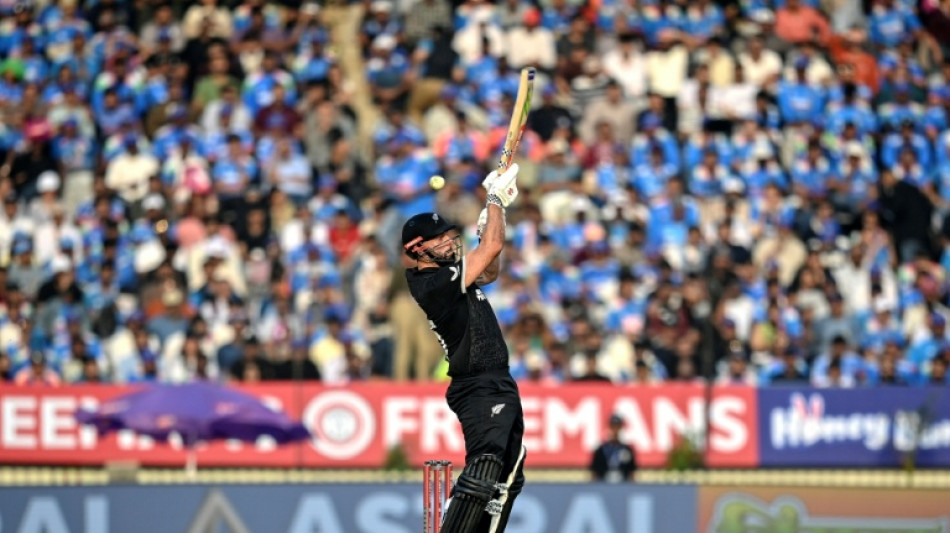 Mitchell lifts New Zealand to 300-8 in ODI opener against India