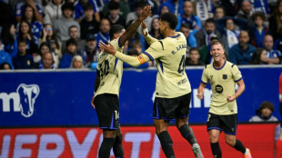 Liga champions Barca claim comeback win at Oviedo