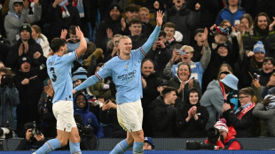 Haaland hits five to ease Man City into Champions League quarters
