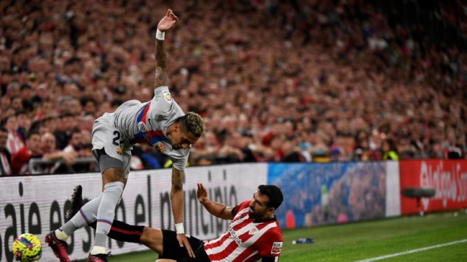 Raphinha snatches leaders Barca fortunate win over Athletic