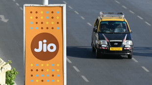 Billionaire Ambani's Jio jumps 21% in market debut after record India IPO