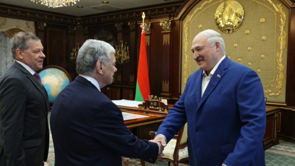 Belarus frees 52 prisoners, including veteran dissident, journalists