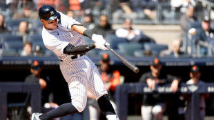 Judge blasts first homer as Yankees win to open MLB season