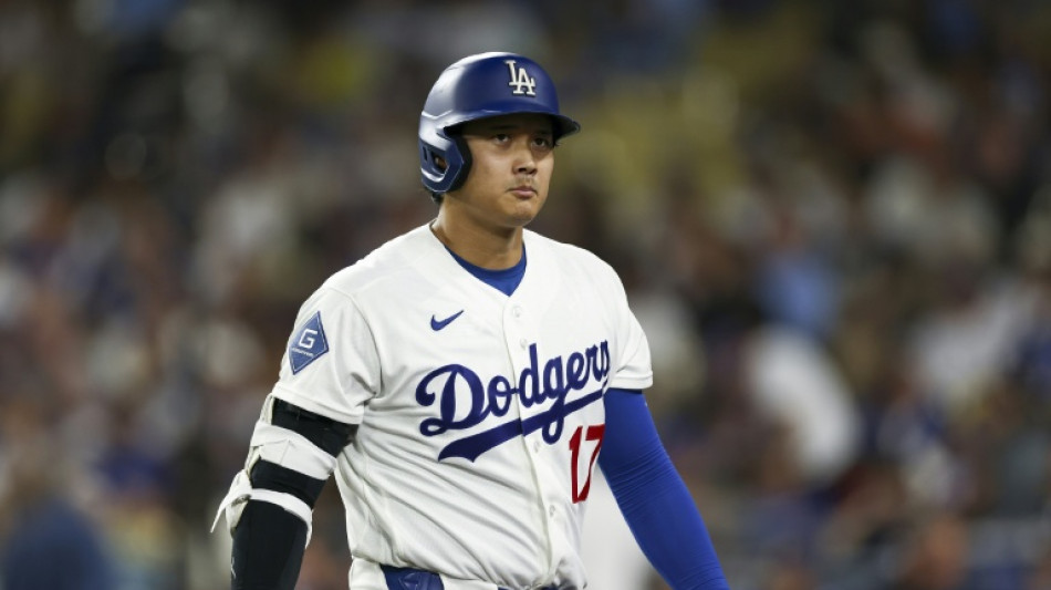 Dodgers face Ohtani knee issues in MLB three-peat bid