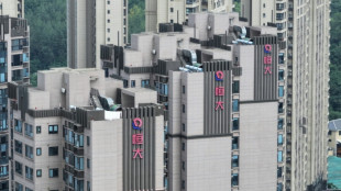 China Evergrande Group says to delist from Hong Kong