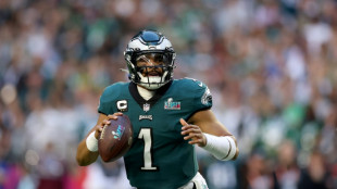 Hurts burns for Super Bowl crown after record NFL deal