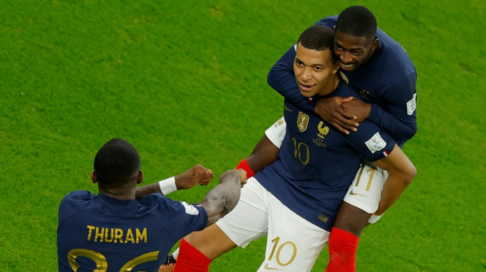 Mbappe double fires France into quarters as England face Senegal