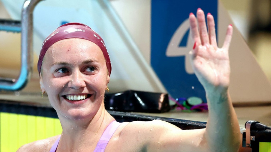 Titmus defies illness to cruise to Australian 400m free title