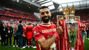 Liverpool spend big to hold off Arsenal, City in Premier League title fight