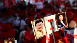 Thailand's Thaksin returns to face arrest