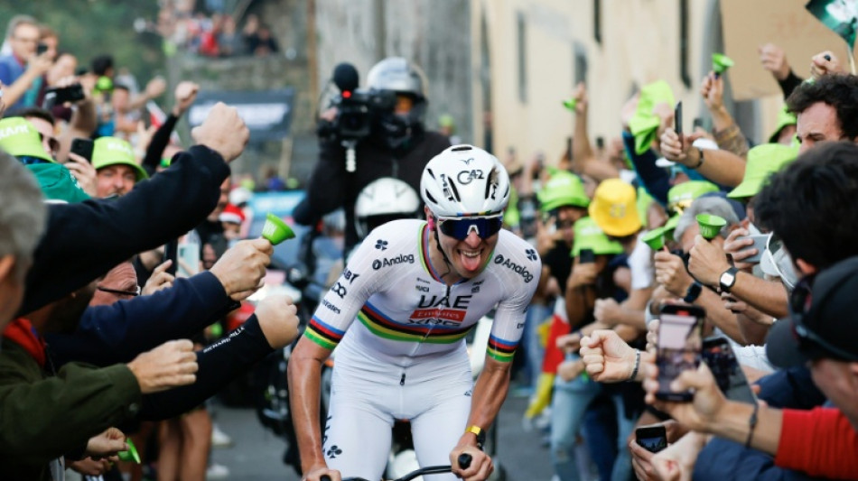 Pogacar chats with Merckx after Il Lombardia landmark