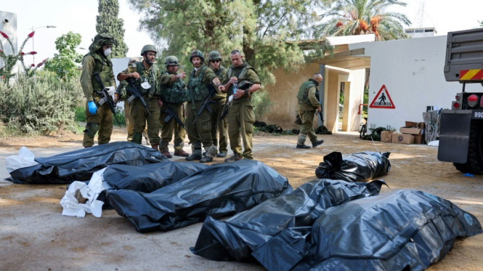 Israel retakes Gaza border area as war's toll mounts