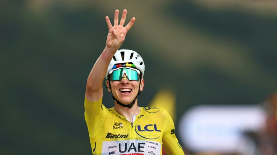 Pogacar wins 'unforgettable' Tour de France 14th stage to extend overall lead