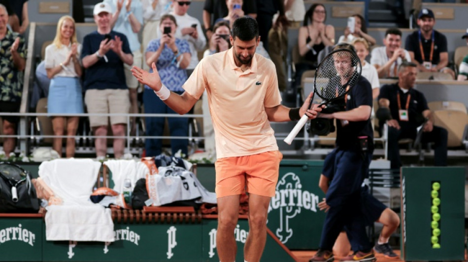 Djokovic fights through tough Roland Garros opener, Zverev strolls