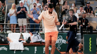 Djokovic fights through tough Roland Garros opener, Zverev strolls