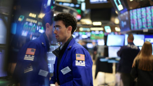 Wall Street termine en baisse face au brouillard commercial