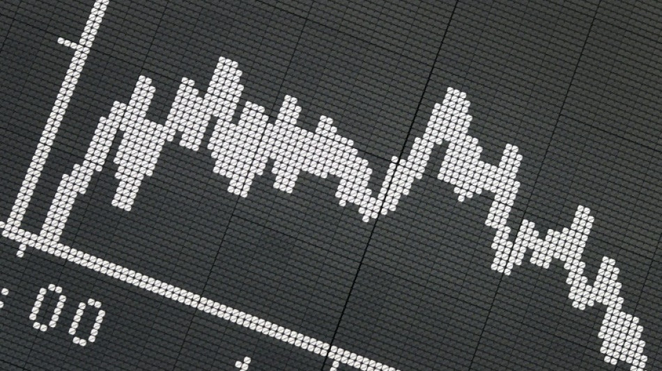 Asian markets mixed as inflation, rate worries temper rally