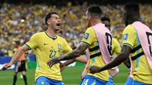 Last-gasp Brazil down Japan to reach World Cup 16