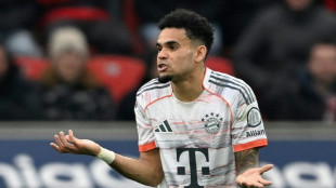 Nine-man Bayern hold on for draw at Leverkusen